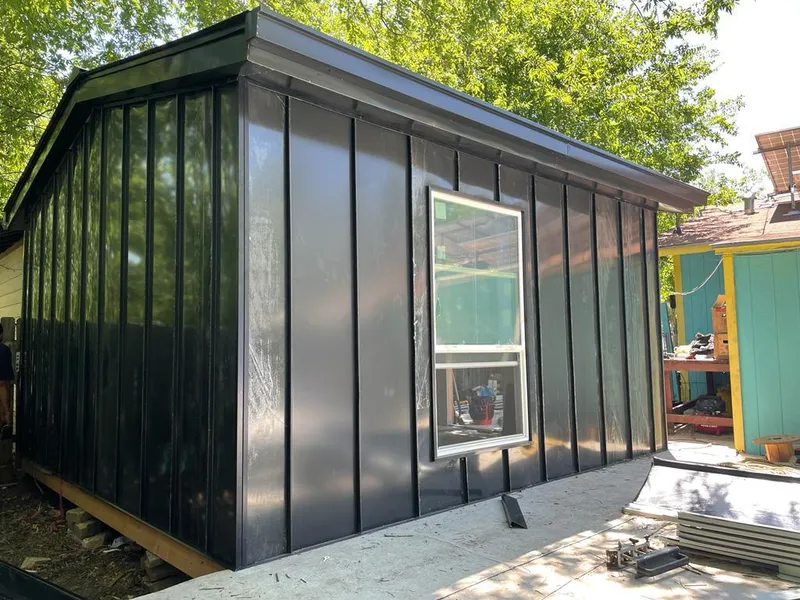 Black standing seam metal wall panels for Roof Inspection in Hollister